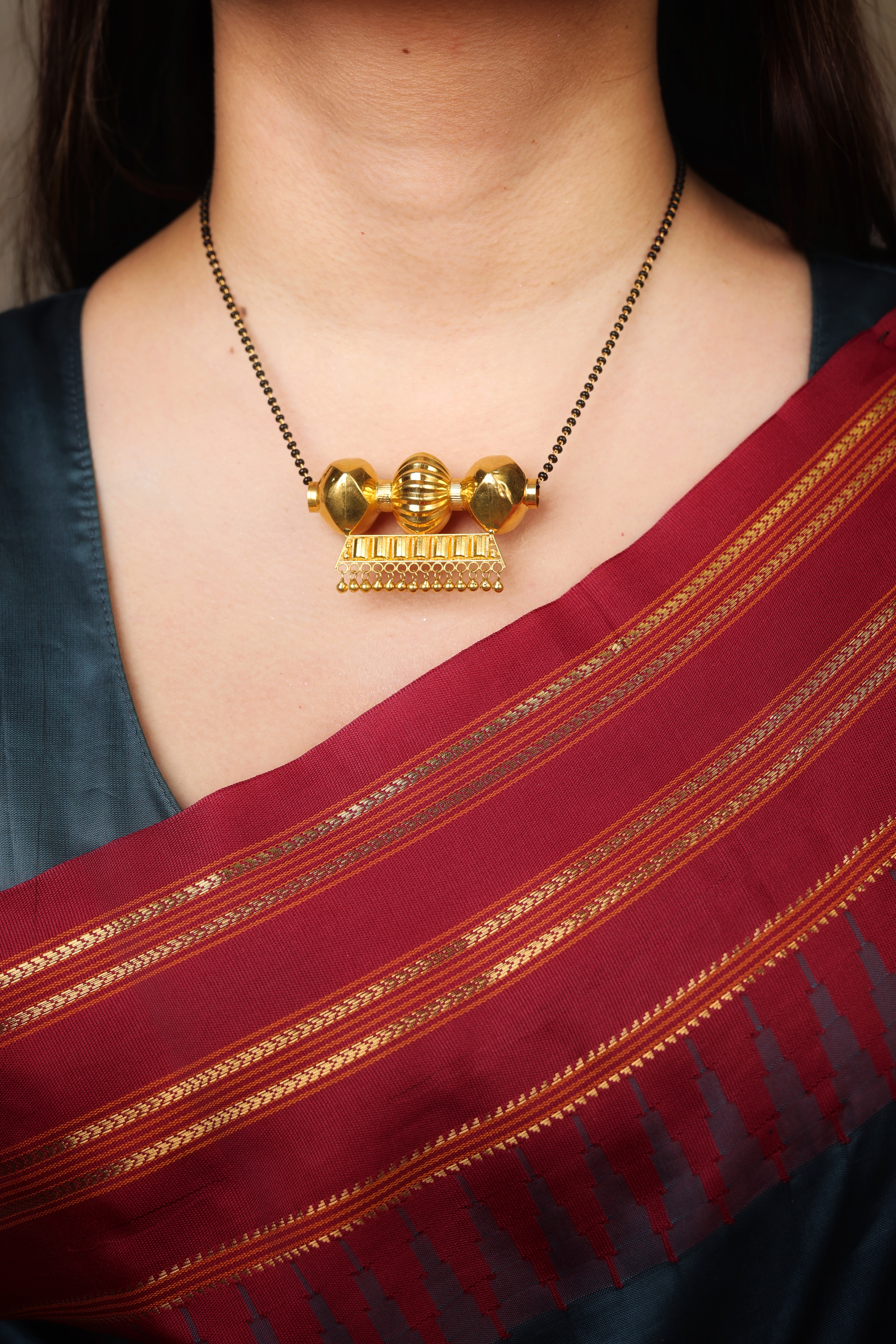 Timaniya Gold Mangalsutra (Cylinder/Dholki Design)