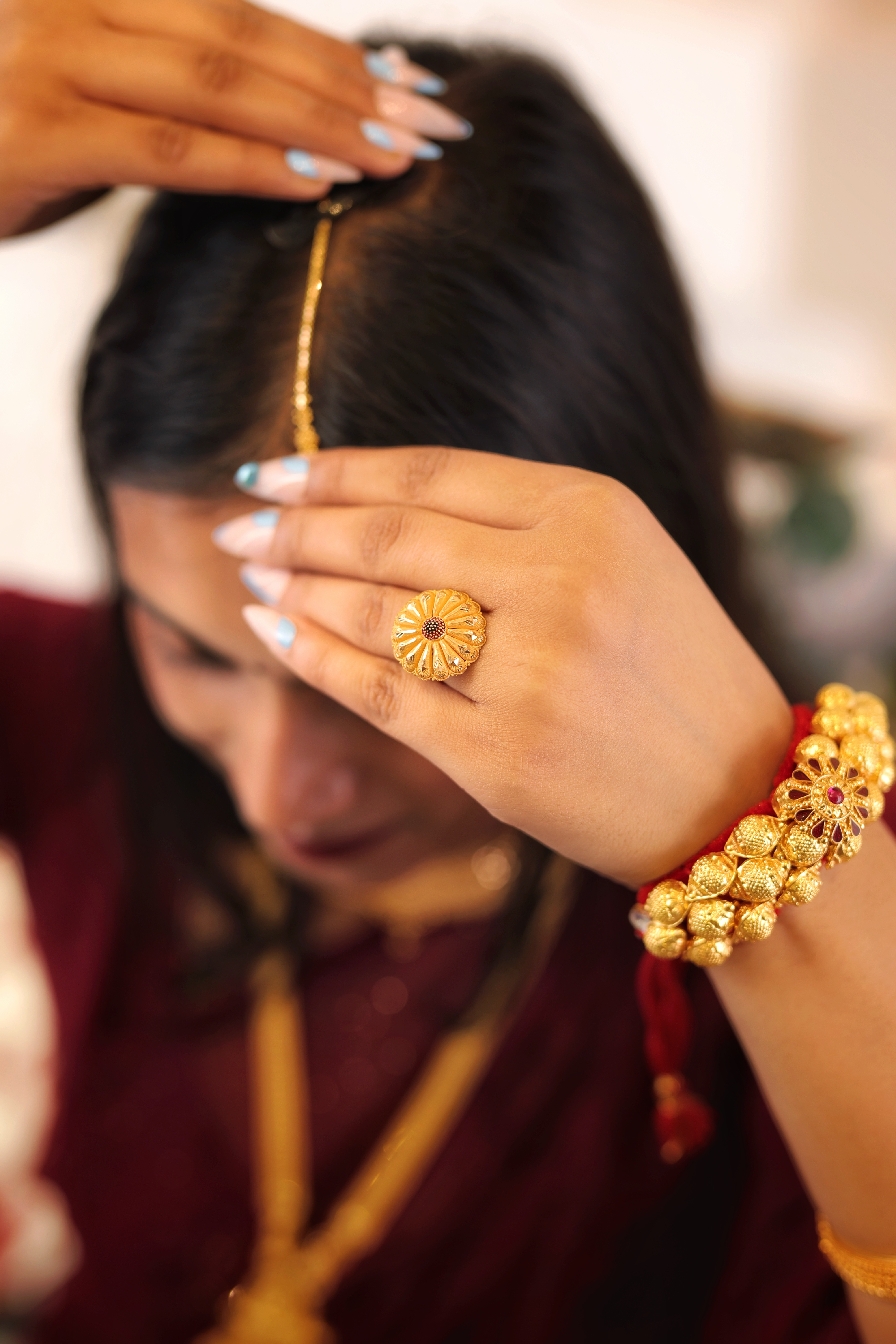 Traditional Floral Sunburst Cocktail Ring with Central Red Accents