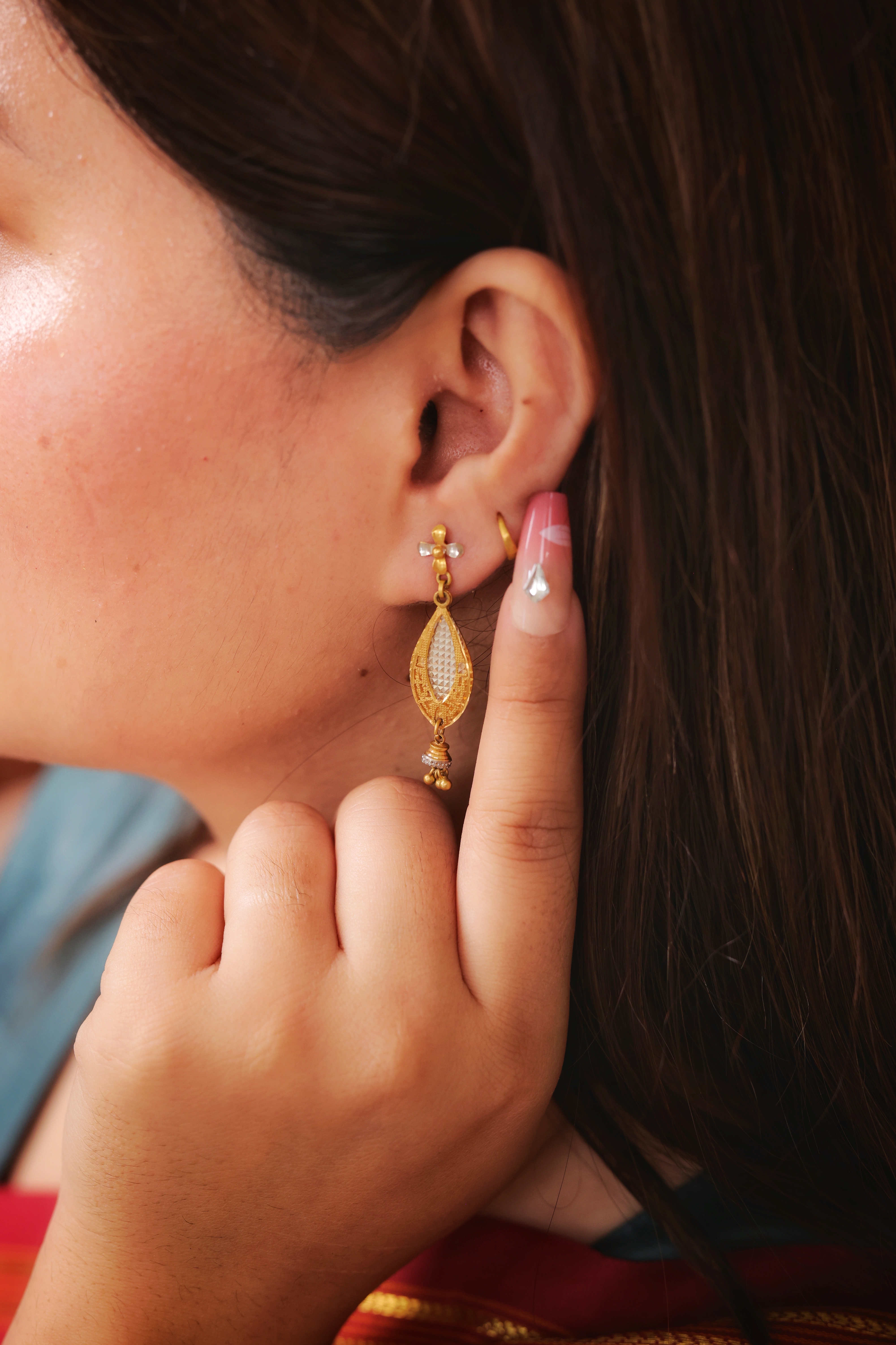 Ornate Teardrop Gold Drop Earrings with White Accent and Dangling Drop