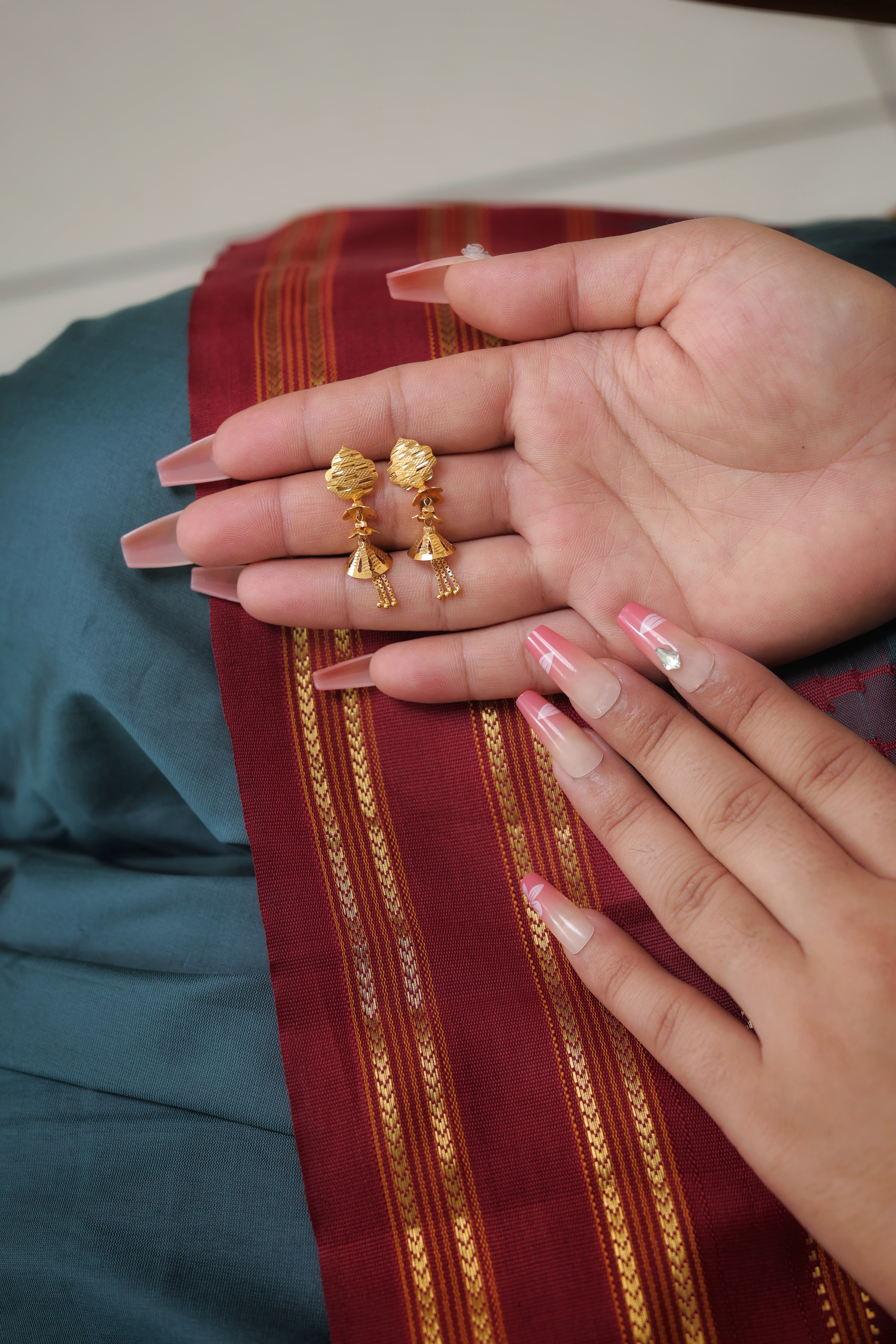 Ornate Floral Stud Earrings with Articulated Bell Drops
