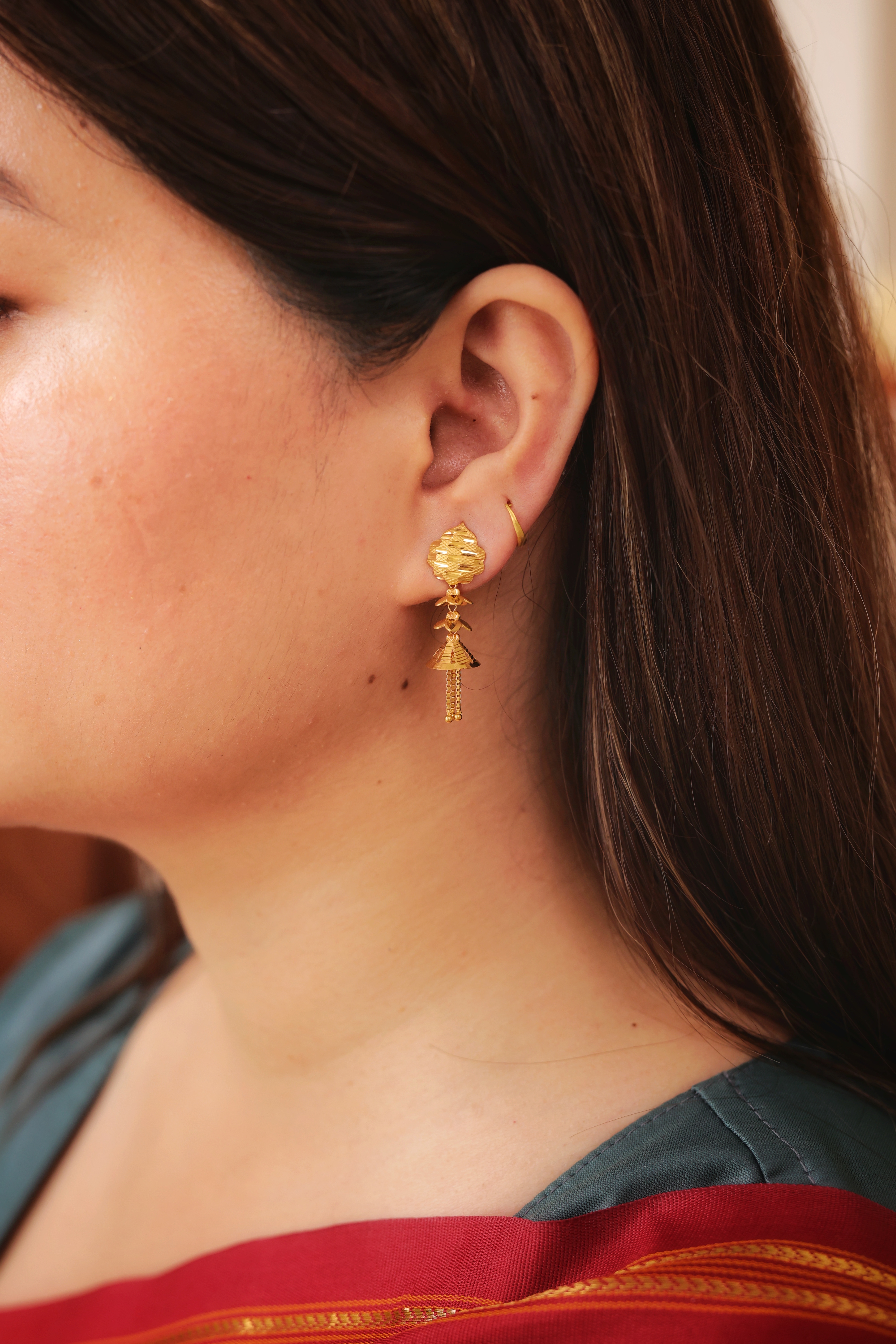 Ornate Floral Stud Earrings with Articulated Bell Drops