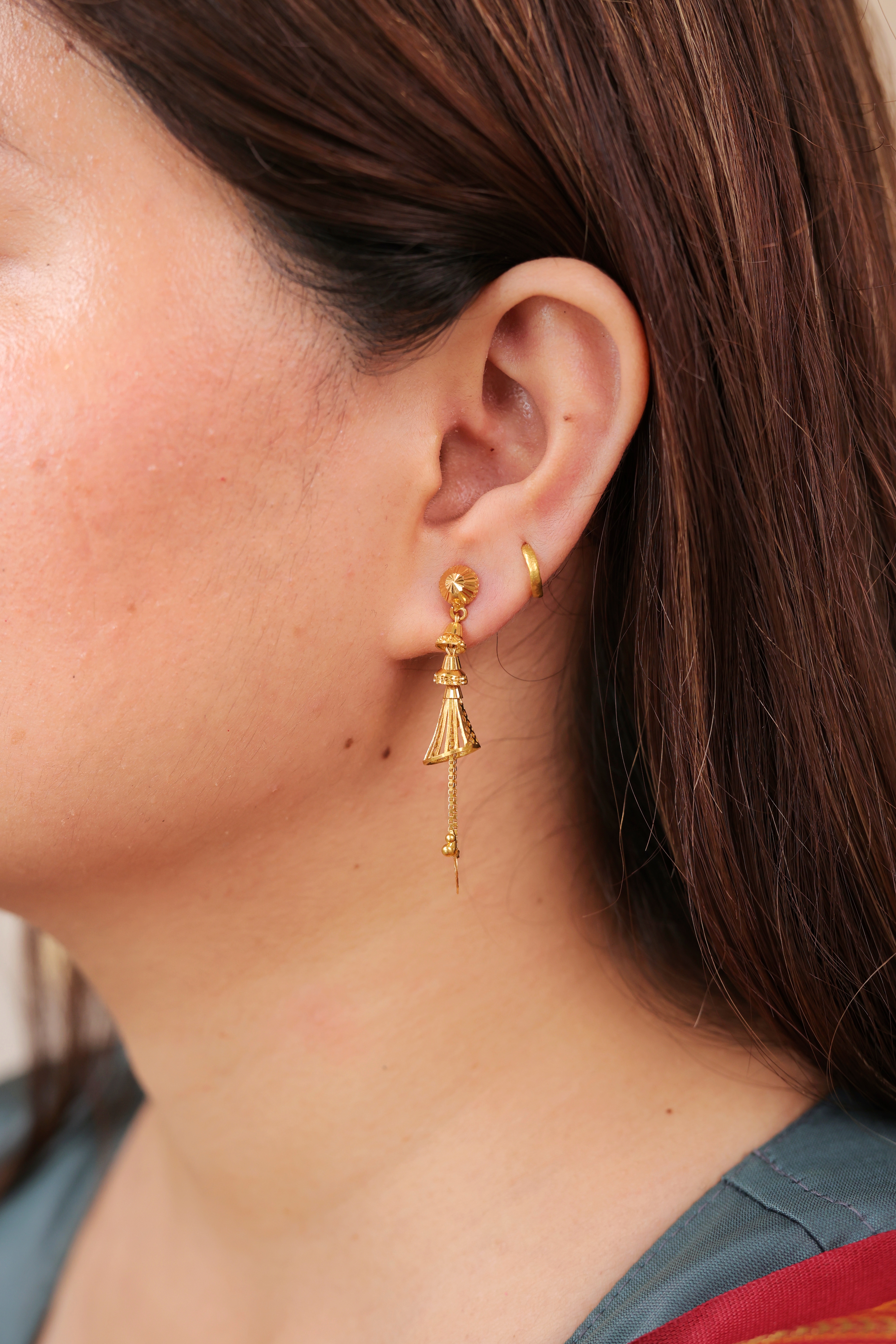 Ornate Articulated Gold Drop Earrings with Basket/Cage Motif