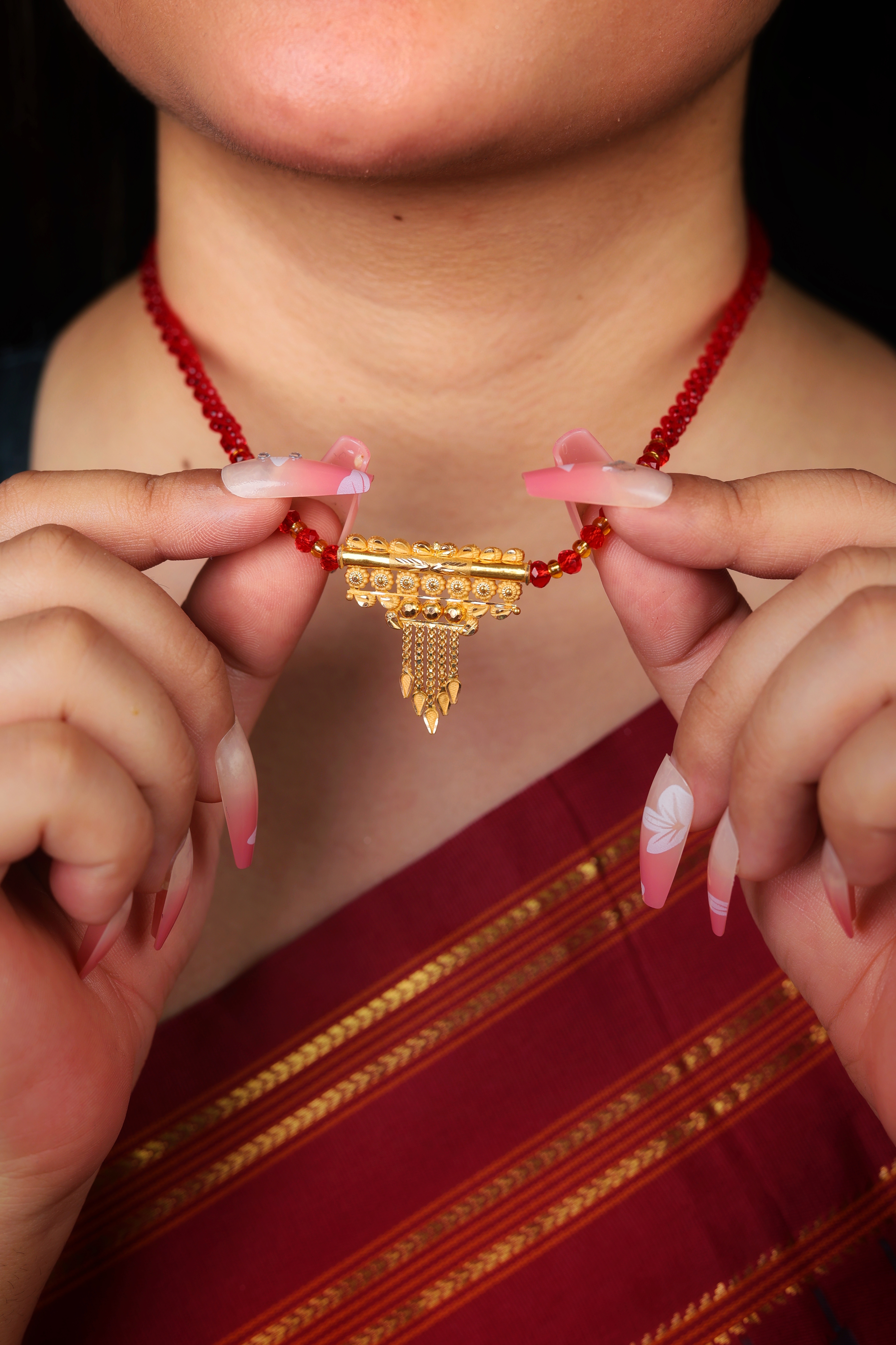 Ornate Temple-Style Gold Pendant Mangal Sutra with Red Beaded Chain
