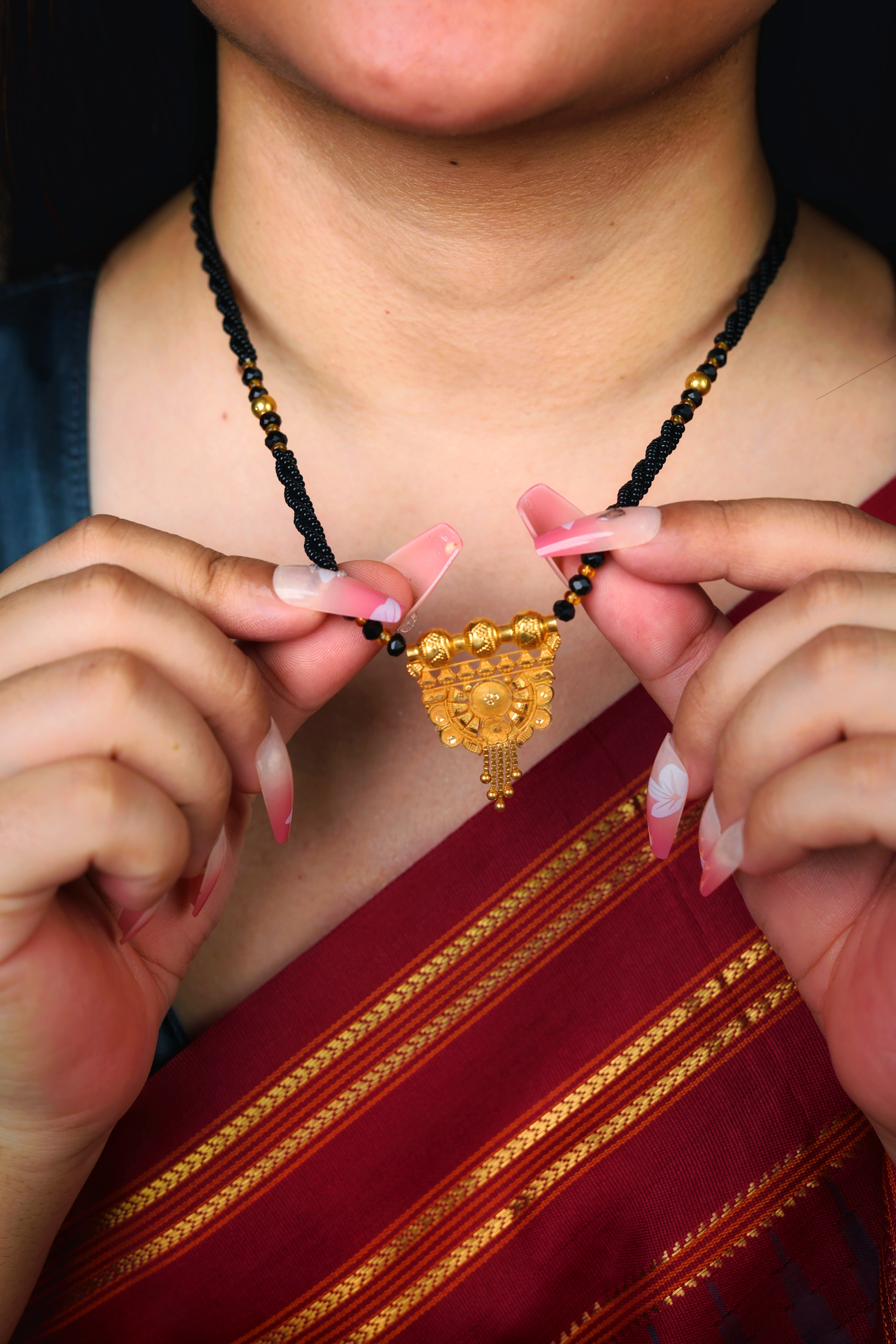 Ornate Floral-Inspired Gold Pendant Mangal Sutra with Black Beads
