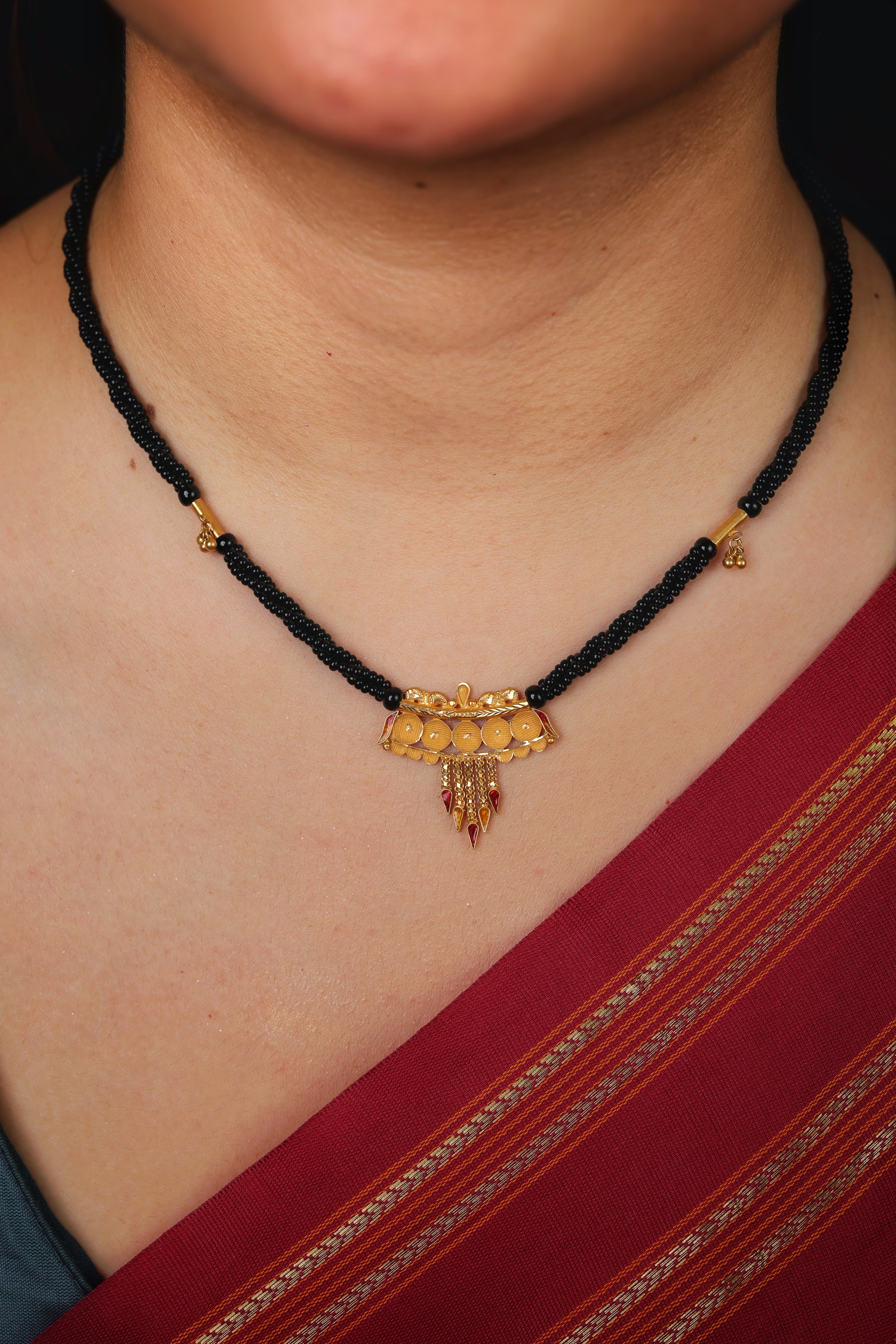 Ornate Scalloped Gold Pendant Mangal Sutra with Black Beads and Red Drops