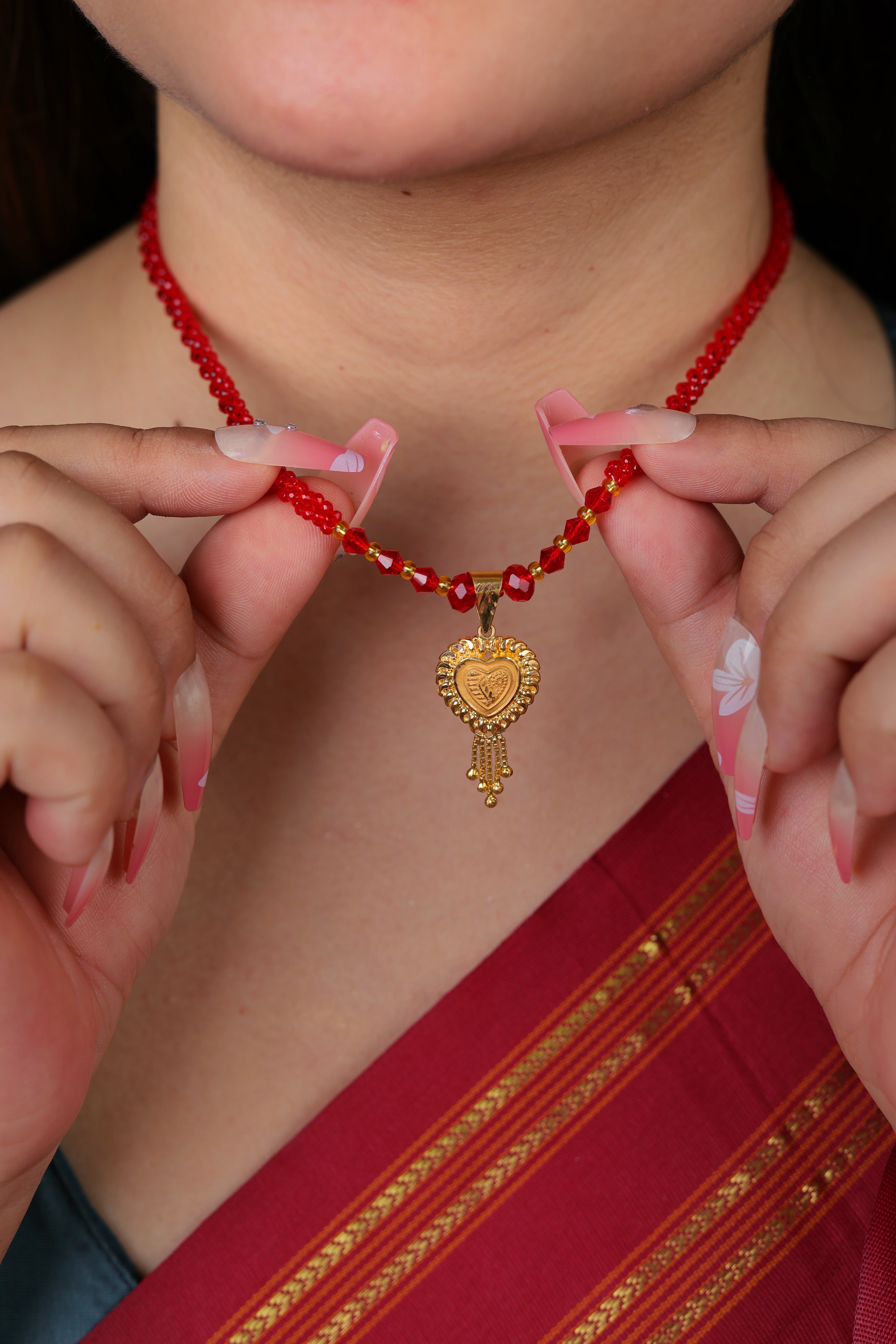 Ornate Heart Gold Pendant Mangal Sutra with Red Beaded Chain