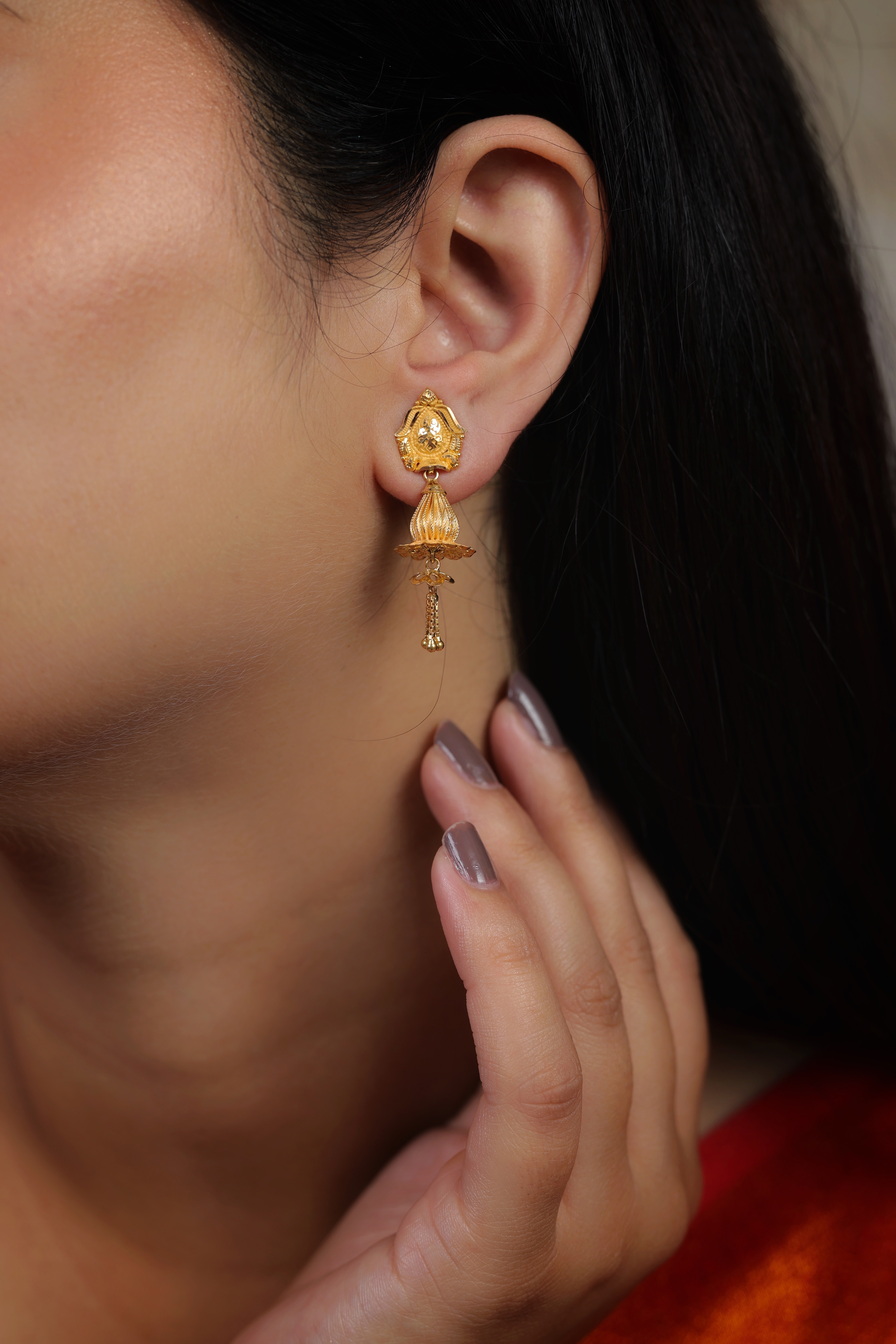 Artisan Paisley Stud Gold Jhumki Earrings with Flared Tassel Drop