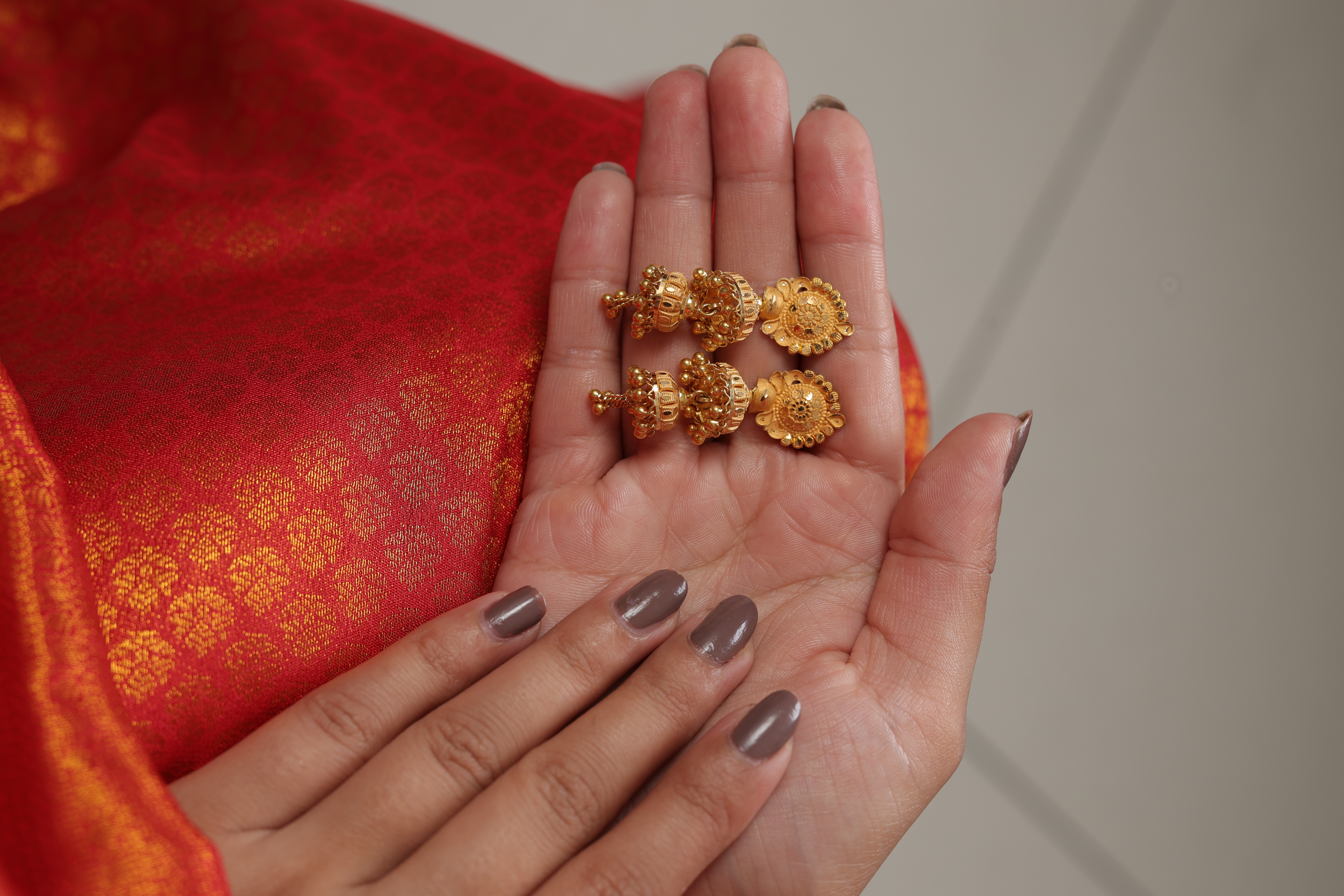 Ornate Medallion-Top Double-Bell Traditional Gold Jhumki Earrings