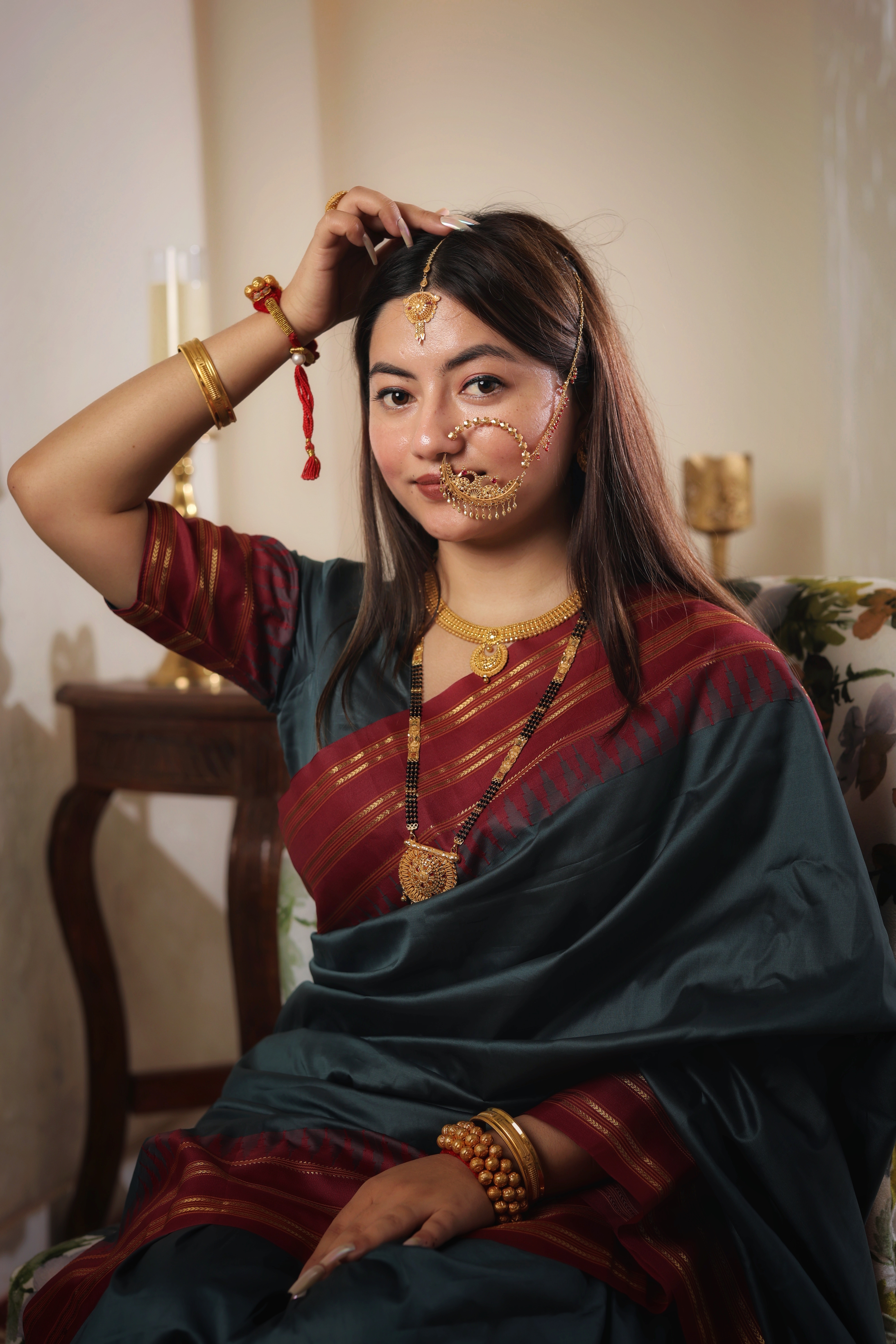 Ornate Shield-Medallion Traditional Gold Maang Tika with Tassel Drop