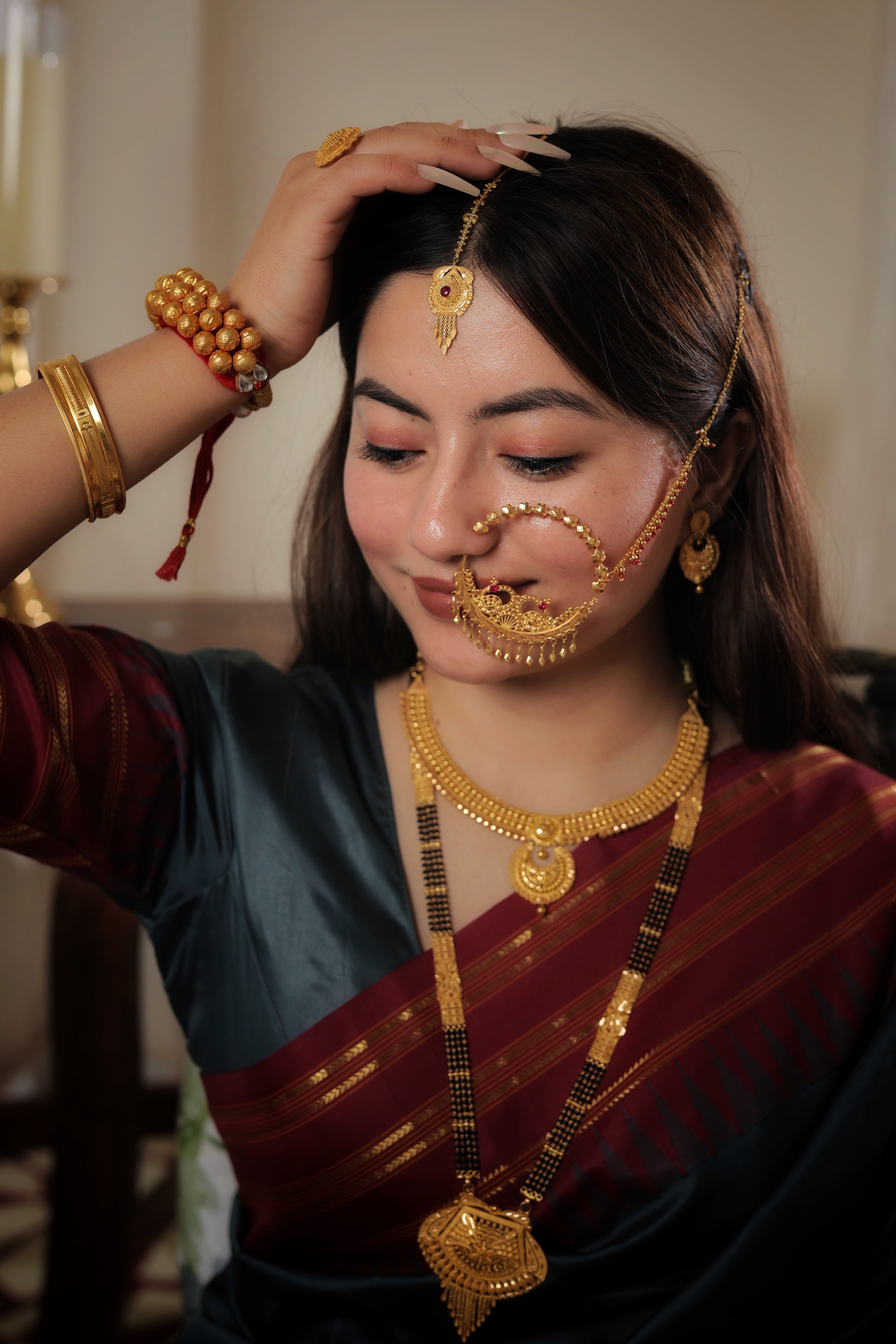 Ornate Floral-Medallion Gold Maang Tika with Ruby Center & Beaded Tassel