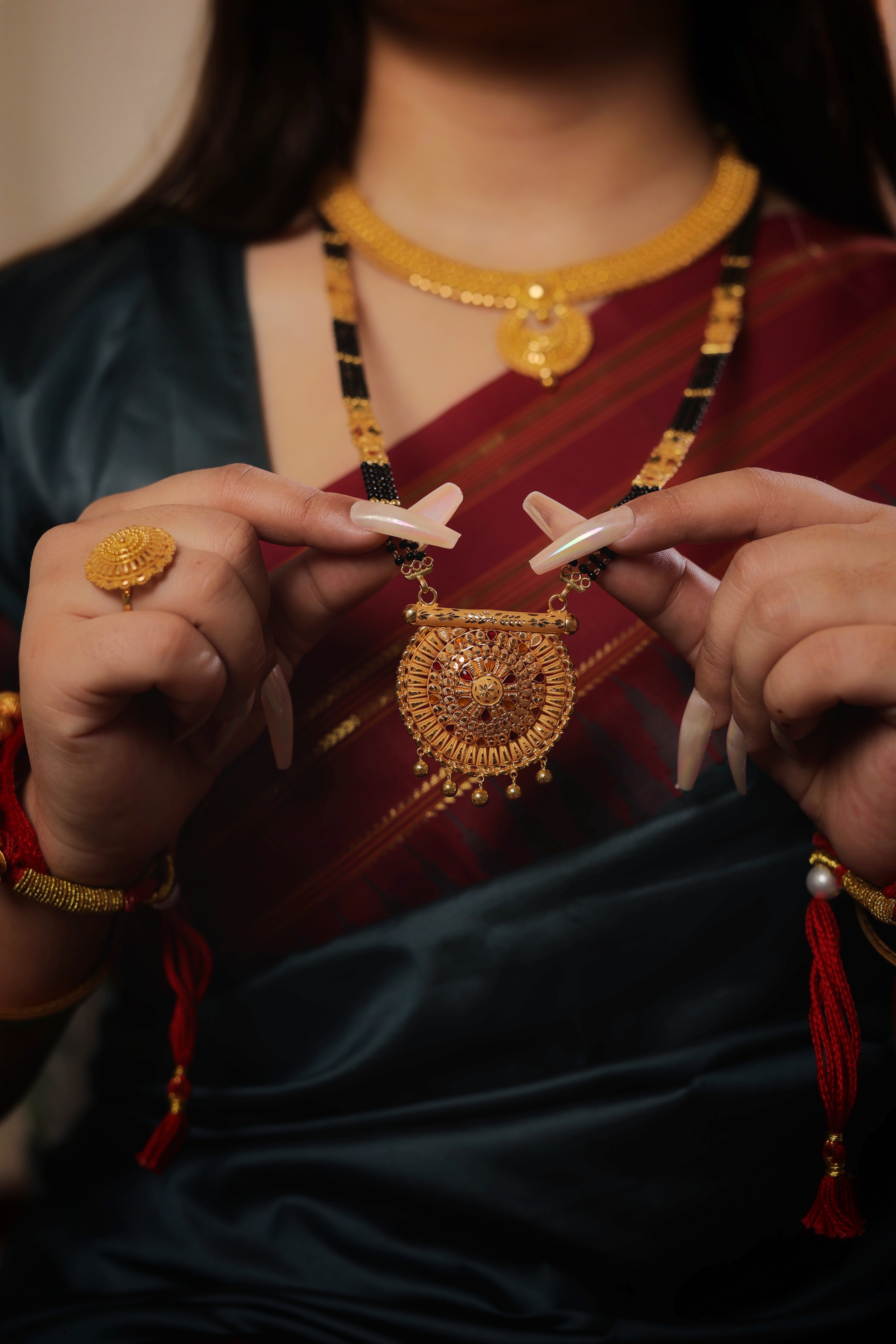 Ornate Circular Filigree Long Mangalsutra with Sunburst Pendant and Golden Droplets