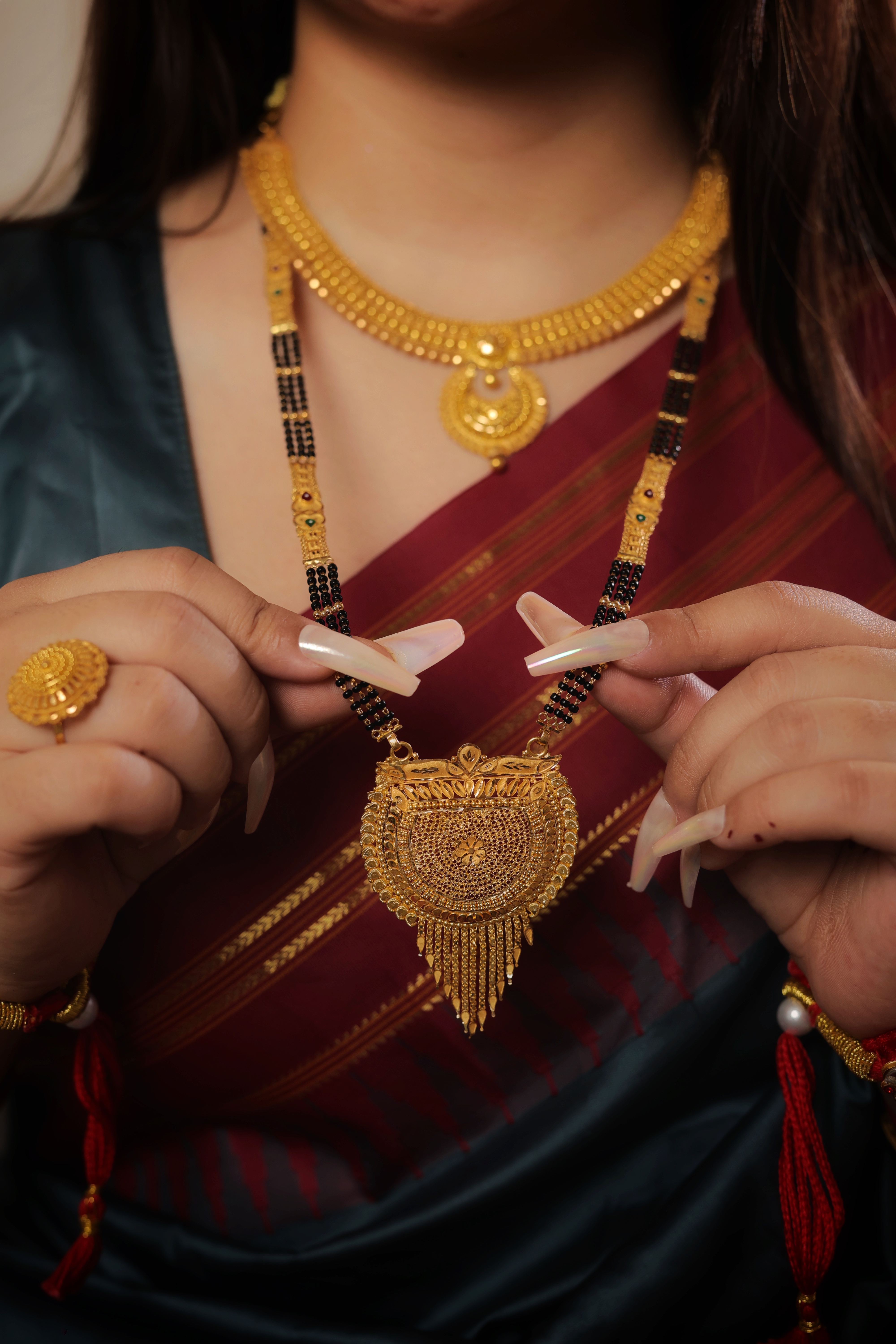 Majestic Shield-Shaped Traditional Long Mangalsutra with Intricate Mesh Filigree and Ornate Tassel