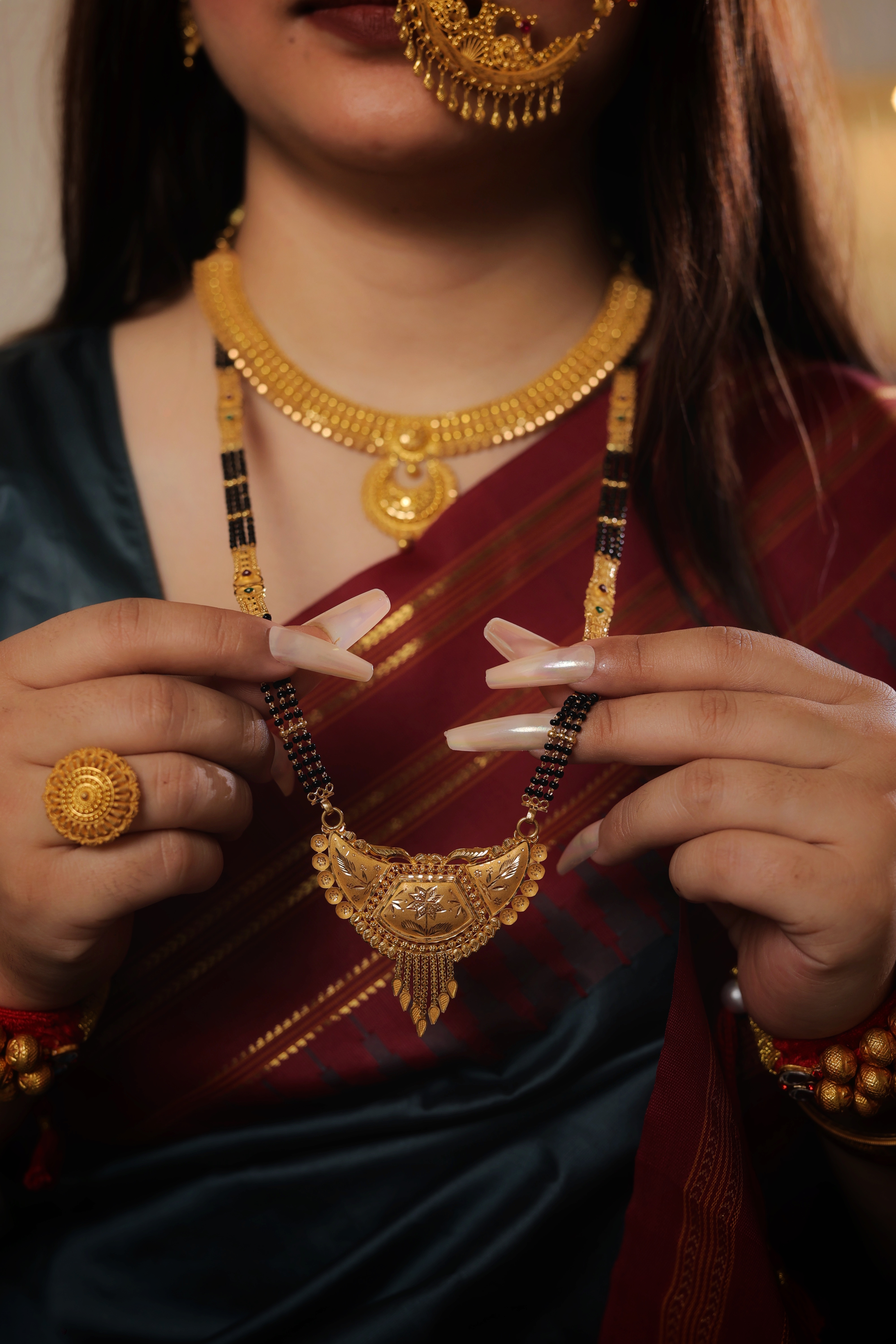 Regal Crescent Hexagon Long Mangalsutra with Floral Etching and Layered Gold Droplets