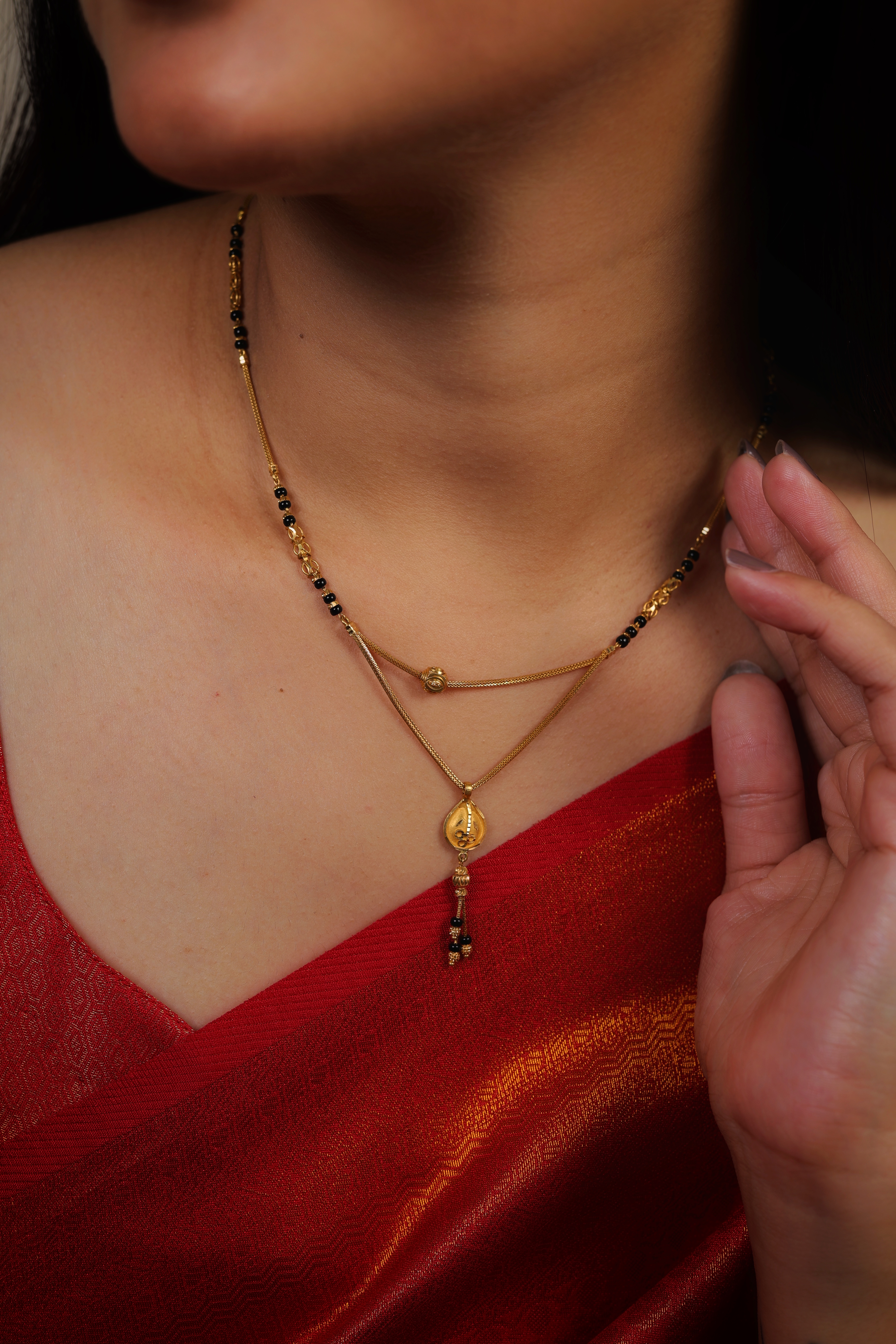 Elegant Dual-Tier Short Mangalsutra with Floral Medallion and Delicate Gold Droplets