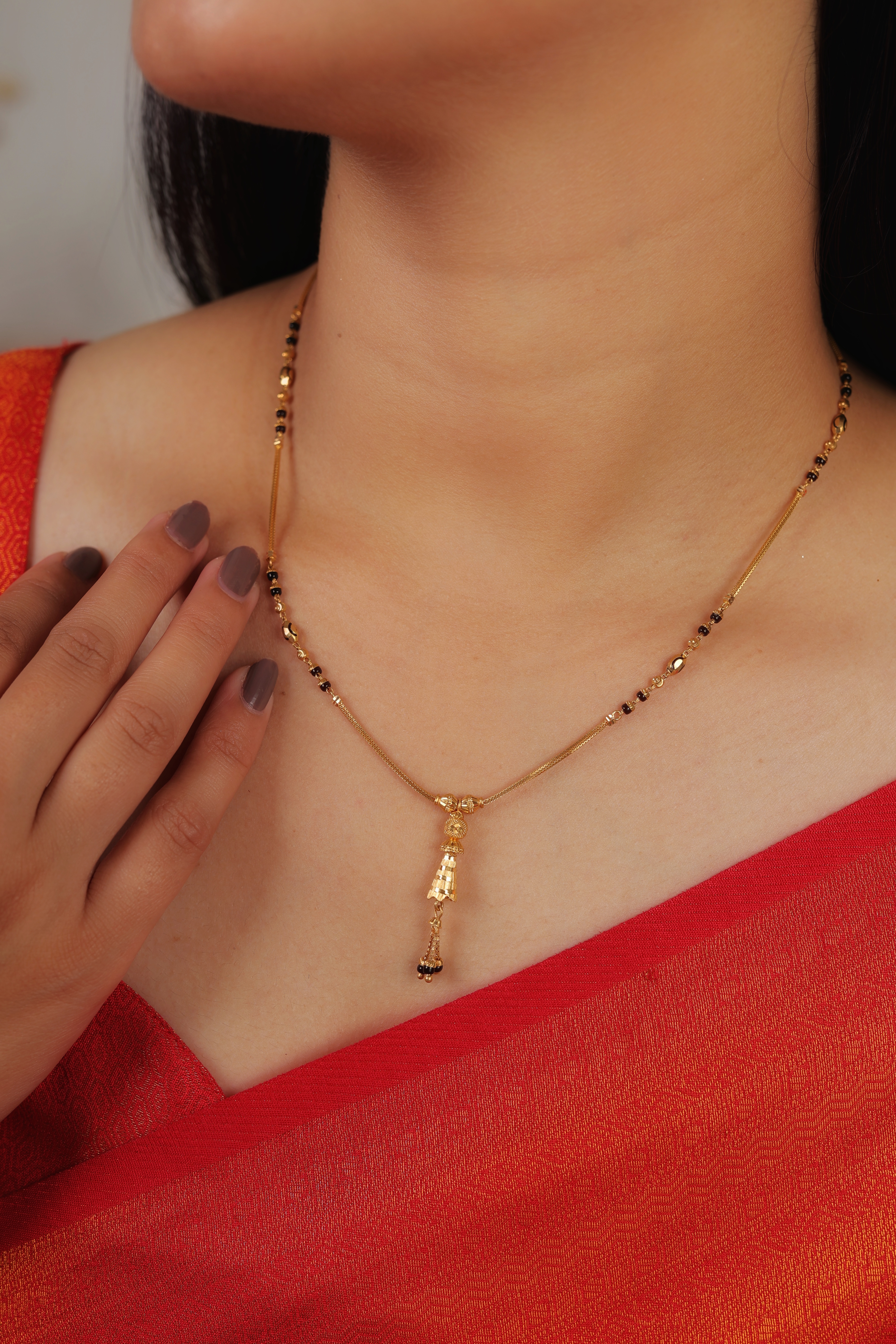 Contemporary 22K Gold Short Mangalsutra with Tapered Pillar Pendant and Delicate Bead Tassel