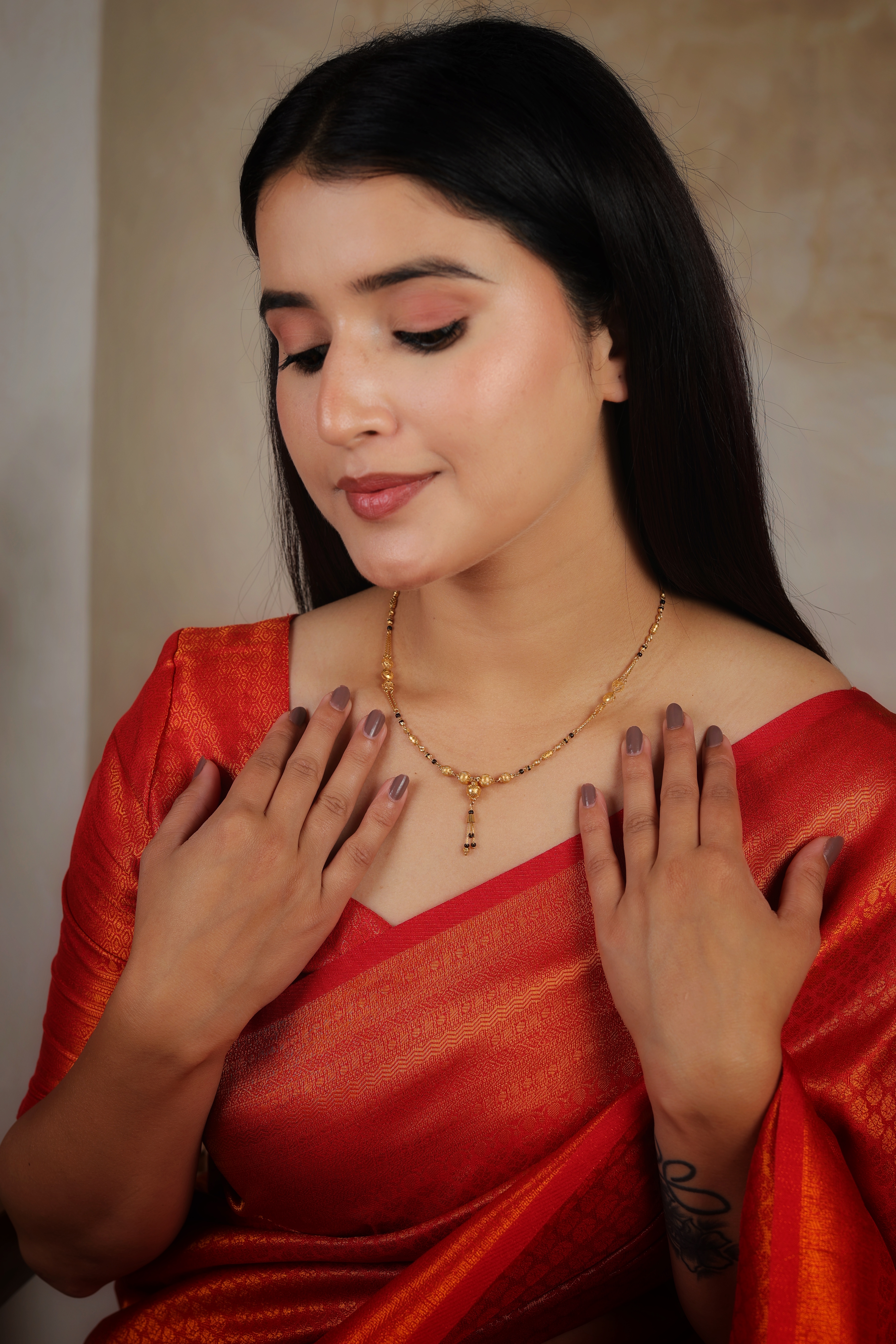 Opulent 22K Gold Short Mangalsutra with Textured Orbs and Multi-Bead Tassel