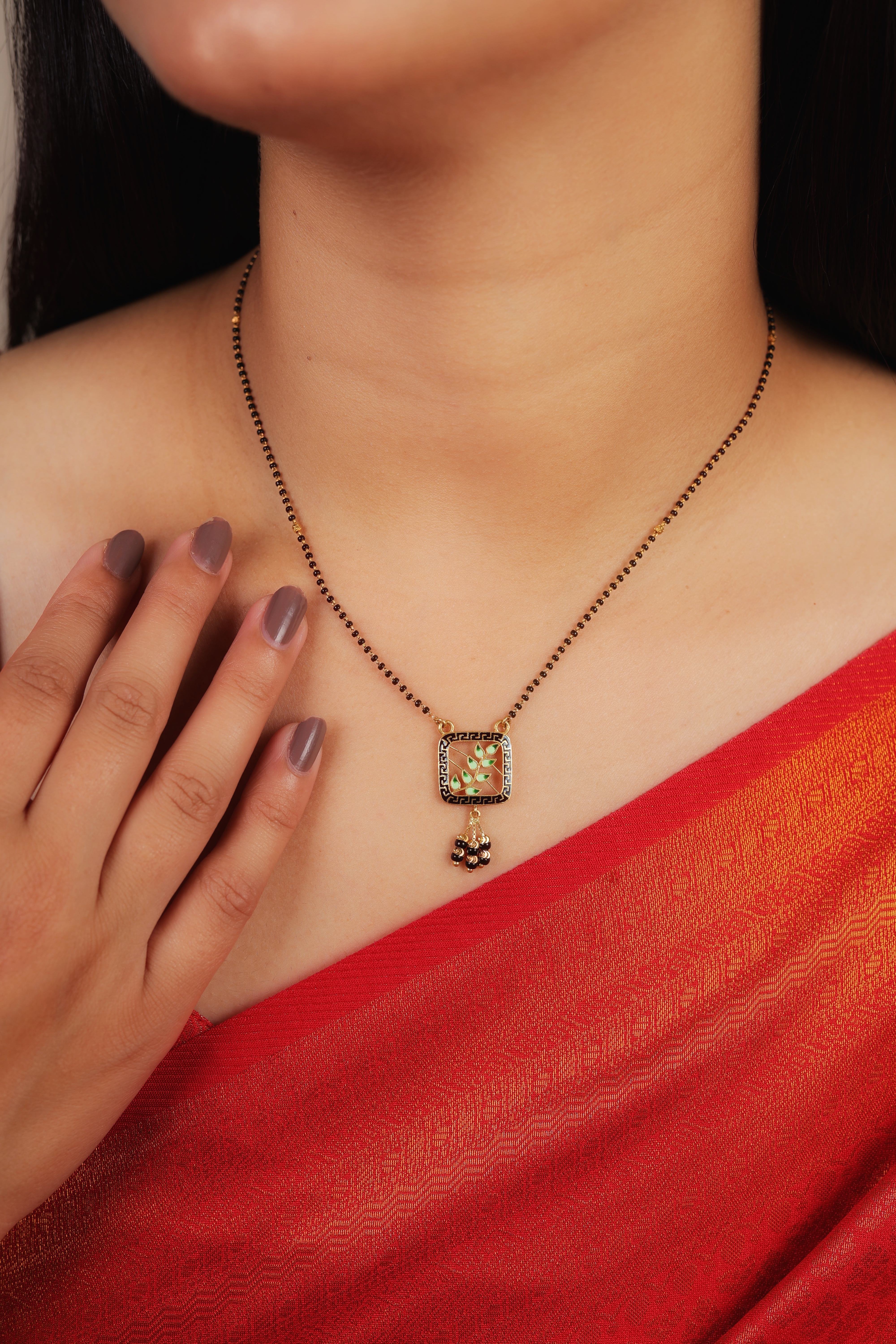 Contemporary 22K Gold Square Mangalsutra with Green Enamel Leaf Motif and Meenakari Accents