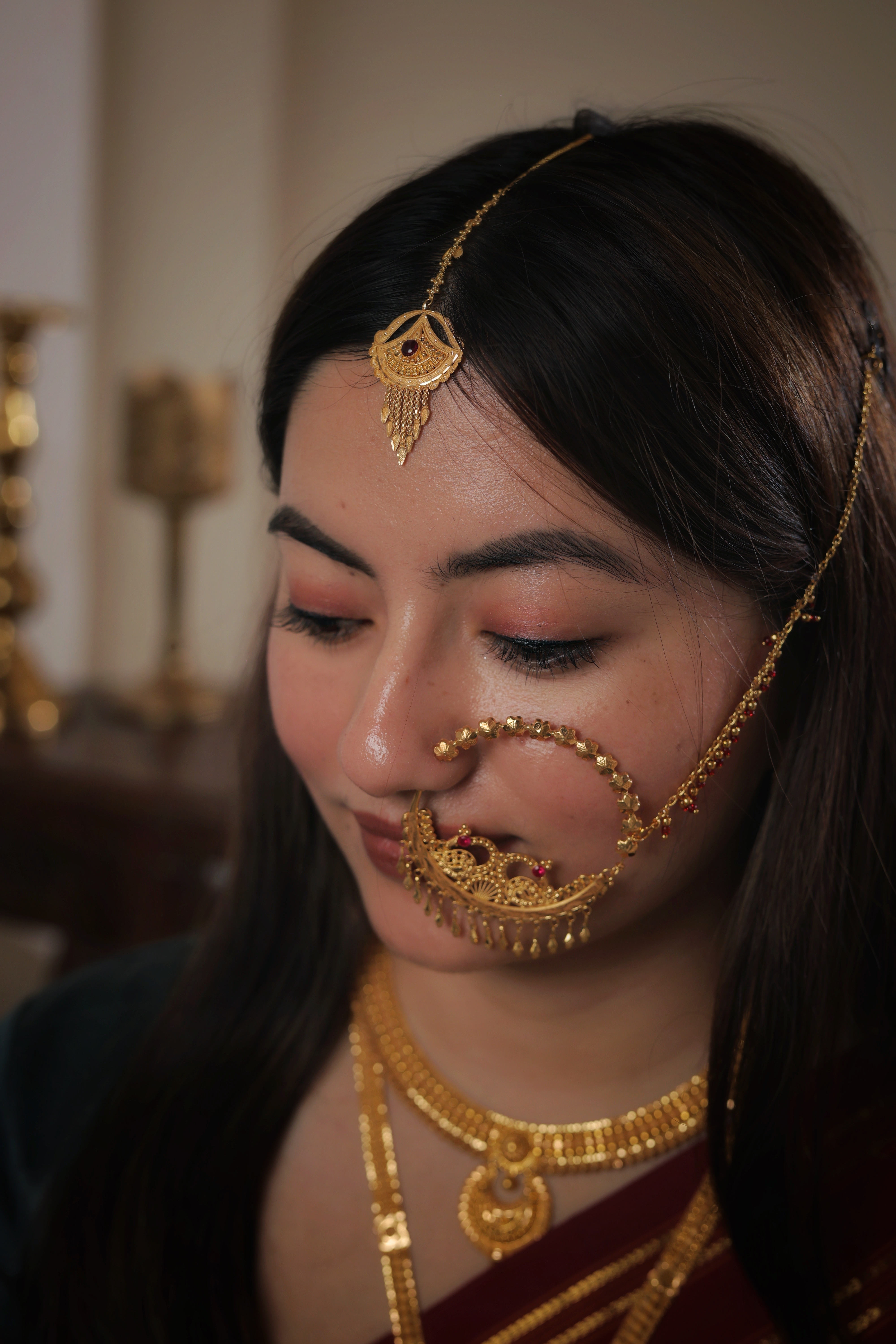 Ornate 22K Gold Ruby-Centered Chandbali Maang Tika with Intricate Filigree and Multi-Strand Tassels