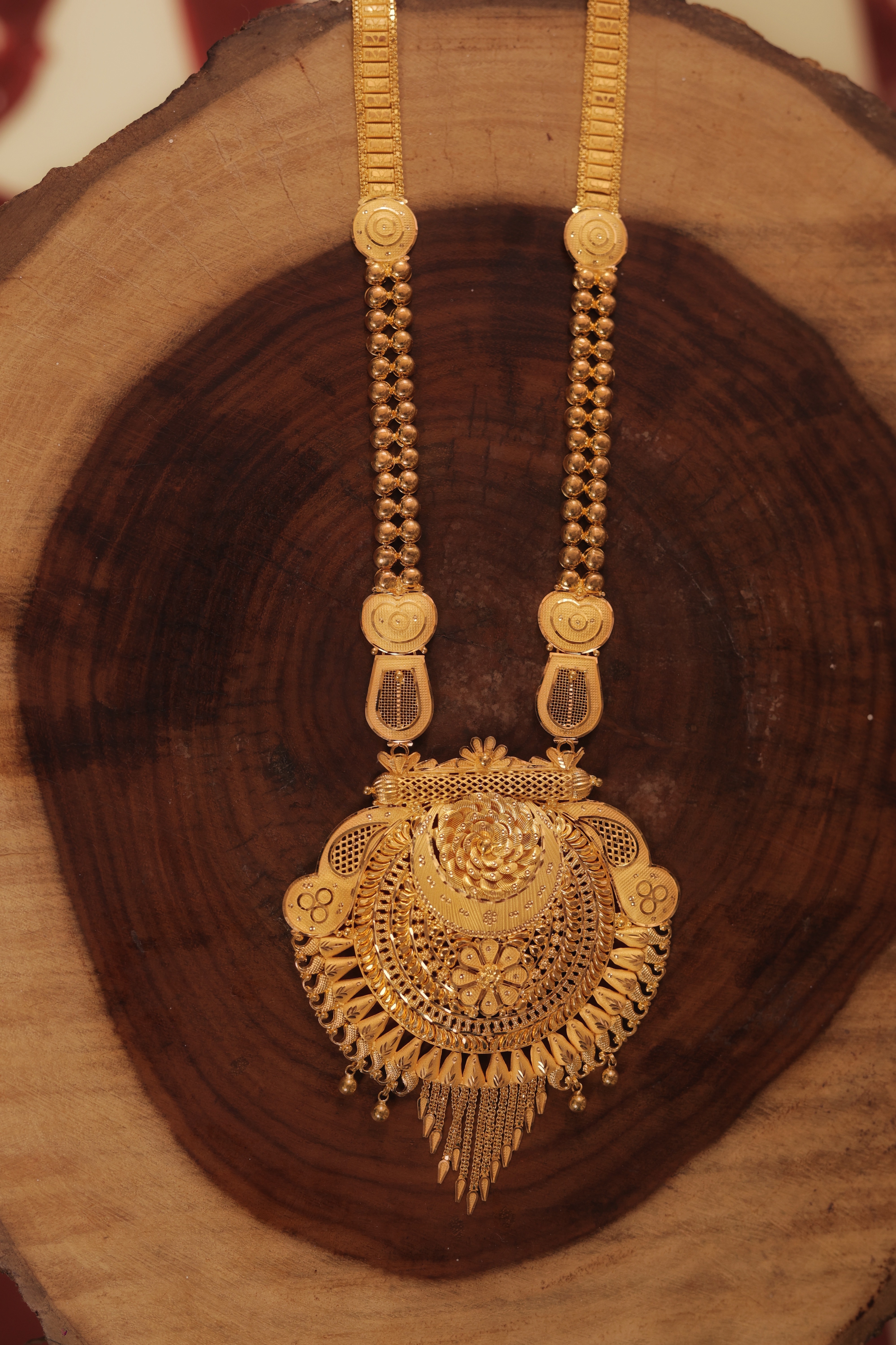 Ornate 22K Gold Rani Haar with Oversized Filigree Medallion and Intricate Etched Chains